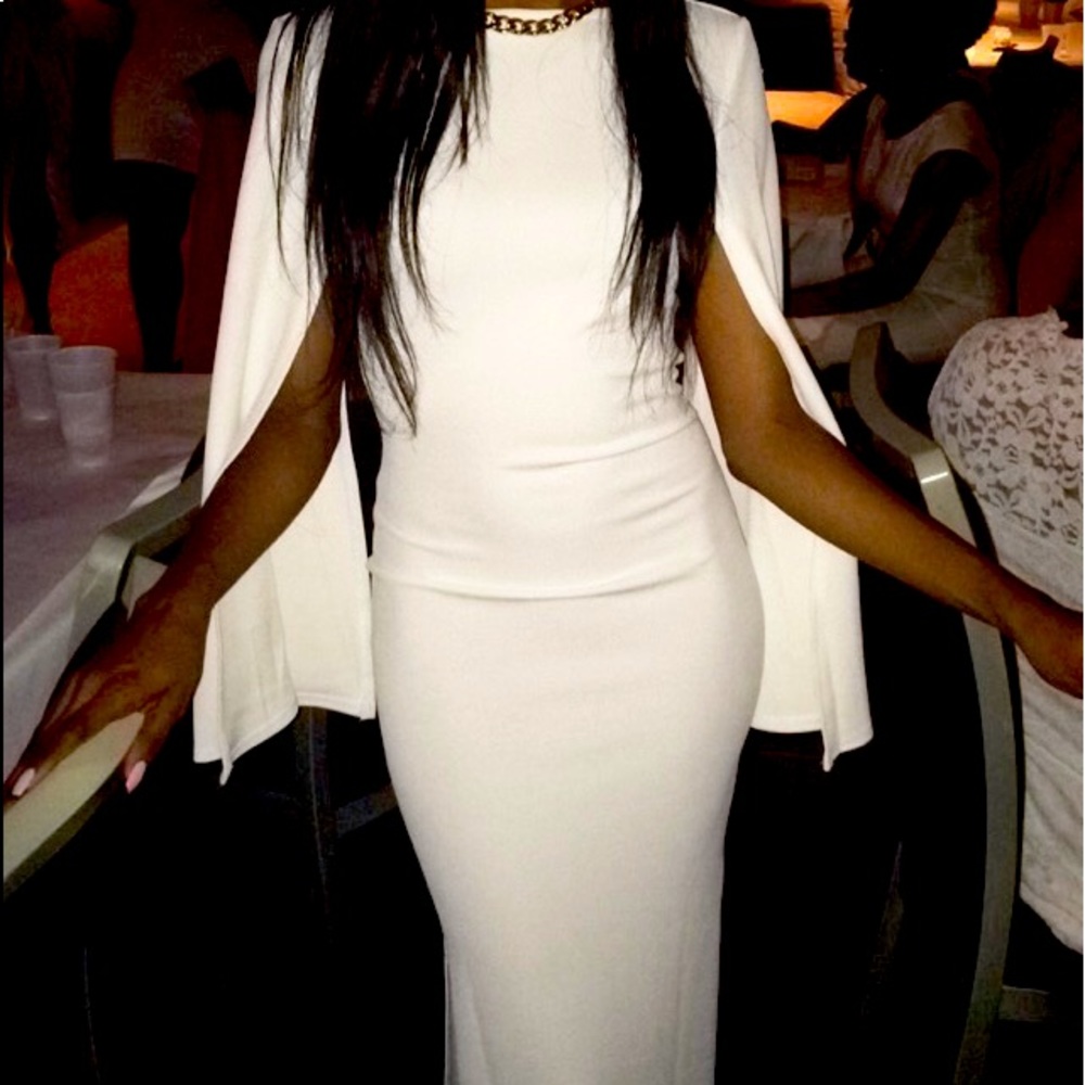 White cape gown